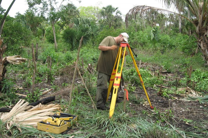 John Gust setting up the total station at Xuxub.