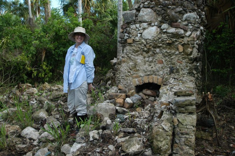 Jen Mathews by the collapsed chimney at Xuxub.  The chimney was used to process sugar cane for rum production.